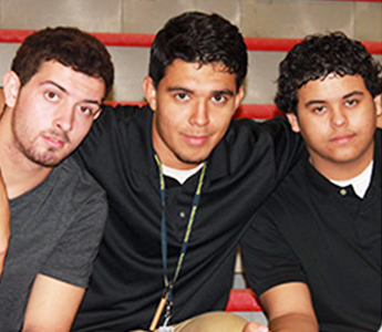 Three students posing for a picture