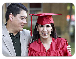 Proud father with graduating daughter