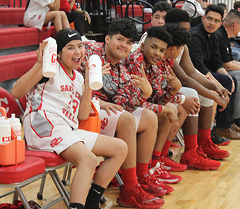 Cheerful students watching a basketball game